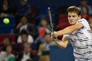 SHANGHAI, CHINA - OCTOBER 14:  David Goffin of Belgium  returns a shot to Andy Murray of Great Britain  during their Quarter-Final match of ATP Shanghai Rolex Masters 2016 on Day 6  at Qi Zhong Tennis Centre on October 14, 2016 in Shanghai, China.  (Photo by Kevin Lee/Getty Images)
